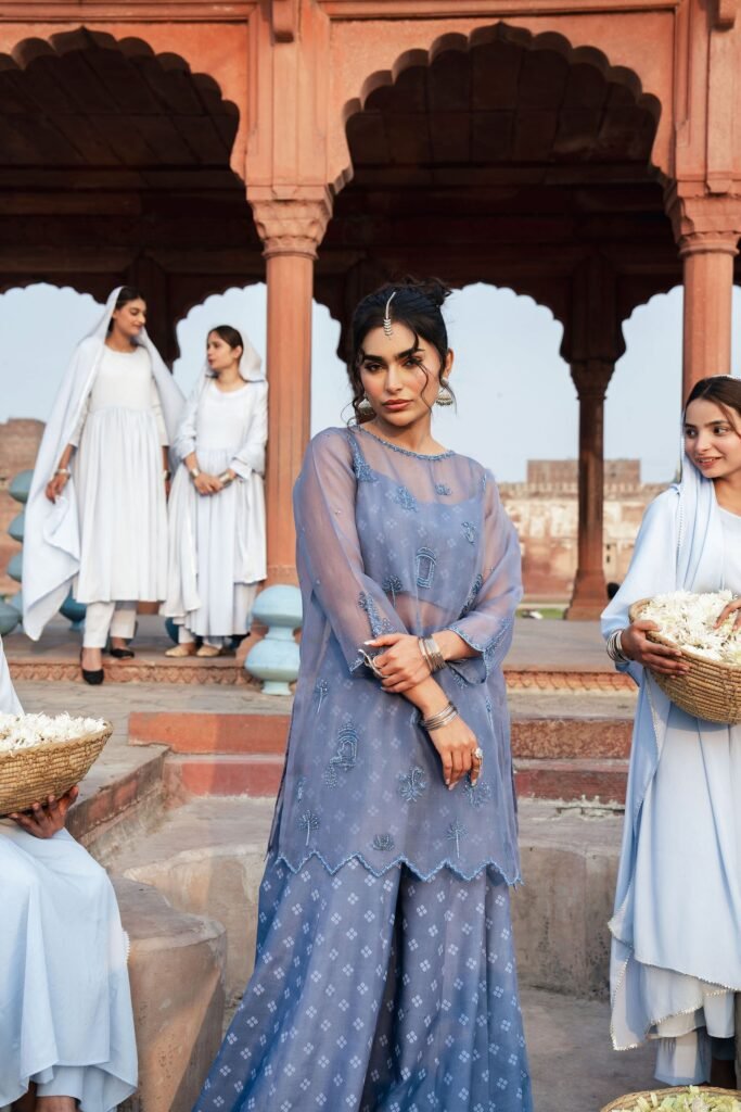 Bagh-e-Nageena: model in a lavender-blue sheer embroidered Anaa Khan ensemble at a Mughal pavilion